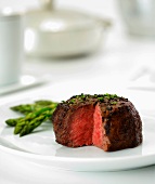 Beef Filet Cooked Rare with Slice Removed; Served with Asparagus