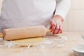Rolling out biscuit dough