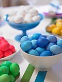 Bowls of Colored Easter Eggs on a Table