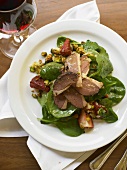 Spinach Salad with Strawberries and Sliced Duck and Red Wine