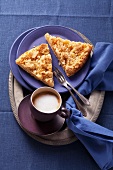Apple crumble tart and a cup of cappuccino