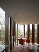 Table and chairs in glass extension