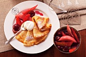 Crepes with rum fruits and cream