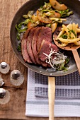 Prime boiled beef with pointed cabbage, pears and potato orzo pasta