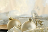 Christmas tree baubles and festive tablecloth