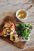 Welsh rarebit with bacon and red onions