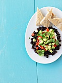 Bean and avocado dip with unleavened bread