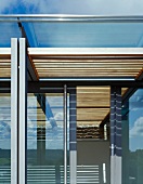 Detail of designer house with glass facade