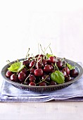 A plate of fresh cherries