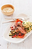 Lamb with grilled vegetables and couscous salad