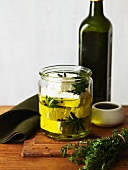 Feta cheese with herbs in olive oil