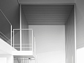 Raumabtrennung mit Treppenaufgang und Galerie