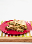 Quesadillas on a red plate