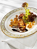 Fried goose liver with a mixed leaf salad