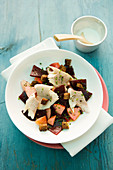 Beetroot salad with trout and apple