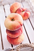 Vineyard peaches on a wooden tray