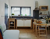 Modern, rustic kitchen with dining area