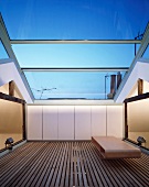 Roof terrace with sliding glass roof