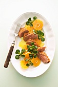 Duck breast with mandarins and lamb's lettuce