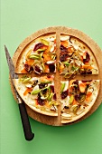Tarte flambée with carrots and spring onions
