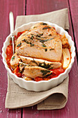 Oven-roasted turkey breast with tomatoes