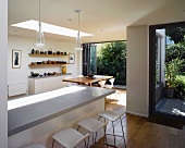 Kitchen counter with bar stools