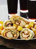 Wraps with breadcrumbed chicken, fried potatoes