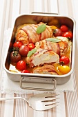 Chicken breast wrapped in bacon filled with mozzarella with cherry tomatoes