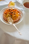 Tort with yellow plums
