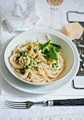 Spaghetti with cheese and basil