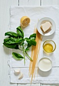 Ingredients for spaghetti with cheese and basil