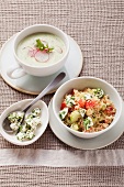 Cream of potato soup with radishes and vegetable couscous with mozzarella
