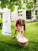 Woman hanging out washing