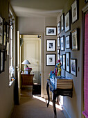 Traditional-style hallway with picture gallery and console