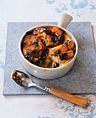Bread and butter pudding with chocolate pieces
