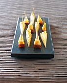 Cheese and pineapple skewers