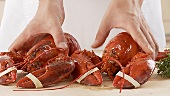 Cooked lobster with rubber bands on claws