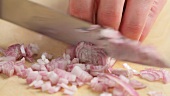 Chopping shallot finely