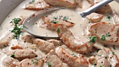 Zürcher Geschnetzeltes (Swiss dish from Zurich consisting of chopped veal, mushrooms and cream)