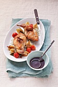 Rabbit legs with onions and tomato and rice, with red wine-mint sauce