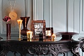 Vases, picture frames & tea light holders on table