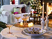 Christmas atmosphere with candles on festive side table
