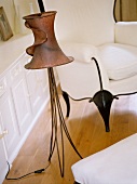 Handcrafted standard lamp made from metal wire with curled lampshade