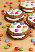 Whoopie pies with colored chocolate buttons
