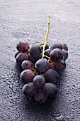 Red grapes with drops of water