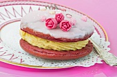 Whoopie pie with butter cream and sugar roses