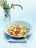 Tagliatelle with red and yellow cherry tomatoes, basil and shaved parmesan
