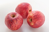 Three apples (variety: Gala Royal)