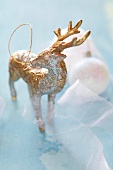 Gold and silver Christmas figurine