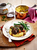 Braised beef in red wine with mashed potatoes